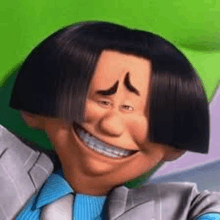 a close up of a cartoon character wearing a suit and tie smiling .