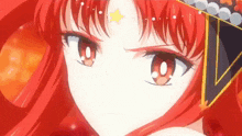 a close up of a red haired anime girl 's face with a star on her forehead .