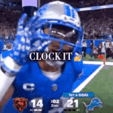 a football player is wearing a helmet and gloves with the words clock it above him