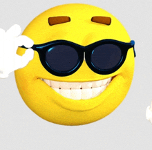 a yellow smiley face wearing sunglasses is giving the ok sign