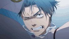 a close up of a man 's face with a very angry expression