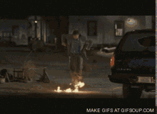 a make gifs at gifsoup.com screen shows a man dancing on fire