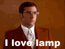 a man wearing glasses and a red suit says i love lamp