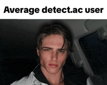 a picture of a man in a car with the words average detect.ac user