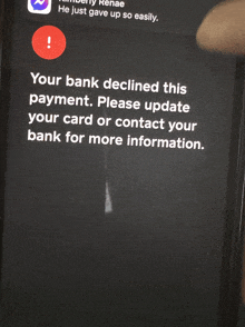 a phone screen displays a message that says your bank declined this payment please update your card or contact your bank for more information