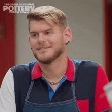 a man wearing an apron and a red white and blue shirt with the great canadian pottery throw down written above him