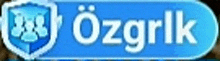 a blue button that says ozgrlk with a shield on it