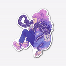 a black sweatshirt has an ice cream cone with a snake on it