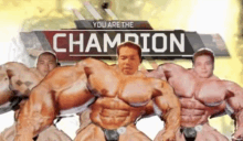 a group of muscle men are standing in front of a sign that says you are the champion