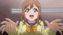 a girl in a yellow shirt with a bow on her bowtie is reaching out her hands