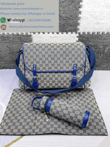 a gucci diaper bag with a blue bottle holder and changing mat