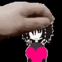 a hand is holding a cartoon character with a pink heart on his head .