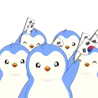 a group of penguins are holding korean flags in their hands