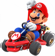 a mario character is driving a red go kart