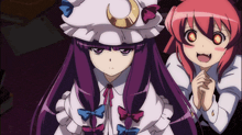 a girl with purple hair and a white hat stands next to another girl with pink hair