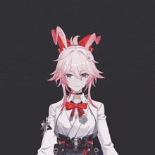 a girl with bunny ears is wearing a white shirt