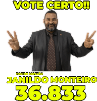 a man in a suit and tie giving a peace sign with the words vote certo behind him