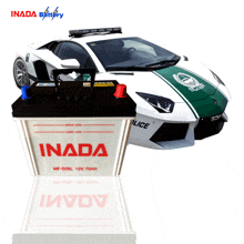 a inada battery sits next to a white and green police car