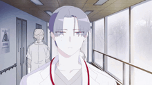 a man in a lab coat with a stethoscope around his neck looks at the camera