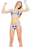 a woman in a bikini flexes her muscles