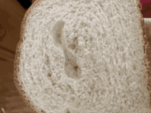 a slice of bread has a hole in the middle of it