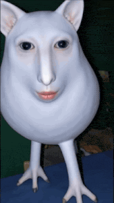 a white statue with a cat 's face and chicken legs