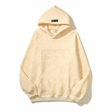 a hoodie that says essentials fear of god