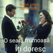 a man is giving a woman a bouquet of roses