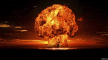 a picture of a nuclear explosion with the caption " nuclear explosion " on the bottom