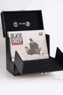 black sheep album in a black case with a sticker that says advisory