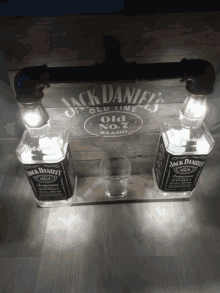 two bottles of jack daniels old no.7 brand whiskey