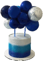 a blue and white cake with balloons on top of it