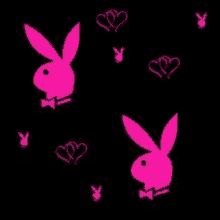 a pattern of pink playboy bunnies and hearts on a black background .