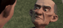 a close up of a cartoon character 's face looking at another person