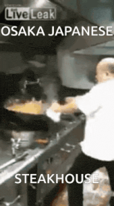 a man is cooking in a kitchen with osaka japanese steakhouse written below him