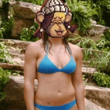 a woman in a blue bikini with a pixelated monkey face on her face