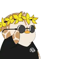 a giraffe wearing a black shirt with a skull on it
