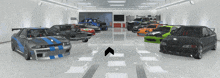 a bunch of cars are parked in a garage with an arrow pointing up