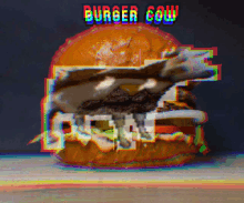 a hamburger with a picture of a cow and the words burger cow