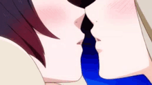 a man and a woman are kissing each other in an anime scene .