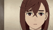 a close up of a girl 's face with a red eye