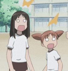 a girl with a surprised look on her face is standing next to another girl with a surprised look on her face