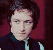 a man with a serious look on his face