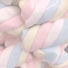 a bunch of pink white and blue marshmallows