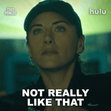 a woman says " not really like that " while wearing a hat