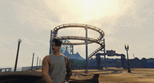 a man is standing in front of a roller coaster that says del perry park