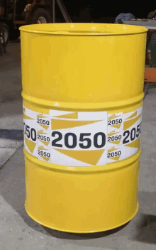 a yellow barrel that says 2050 on the side