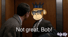 a man in a suit and tie is talking to a monkey with a crown on his head that says not great bob