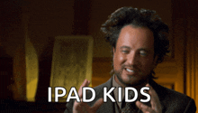 a man in a suit and tie says ipad kids in front of him