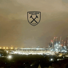 a logo for west ham united london is above a stadium